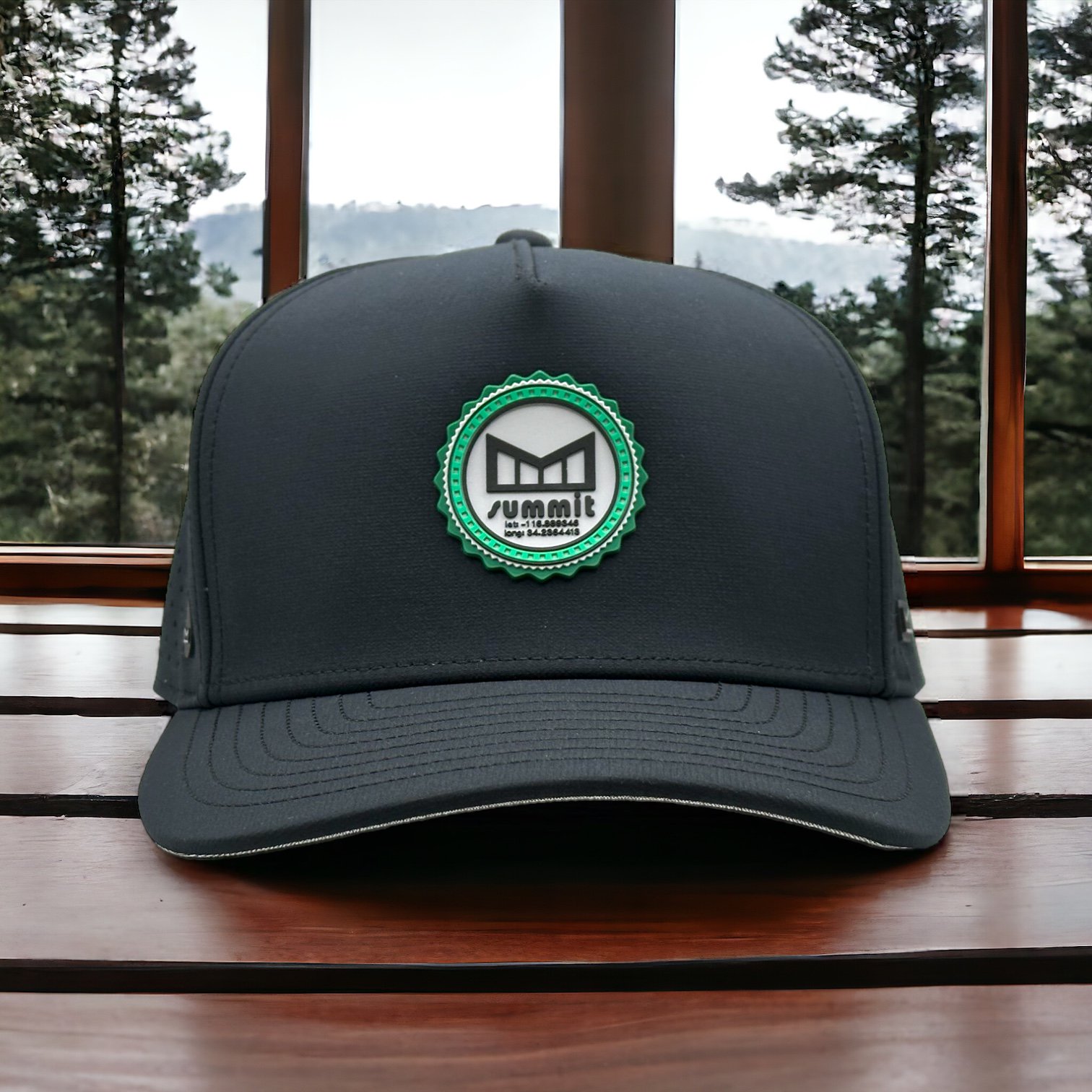 Black Melin and Snow Summit collaboration curved bill hat with circle Summit logo on front